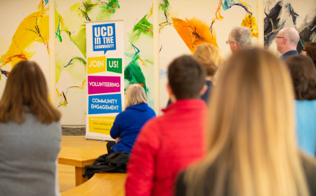 UCD staff and students watching the launch of the UCD Community Engagement Report